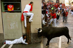 Guy on post while Running With The Bulls